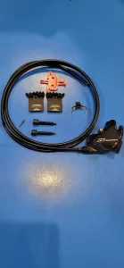 SHIMANO brzda silniční ULTEGRA BR-R8070 kotouč zadní flat mount polymer L03A+chaldič šroub 25 mm